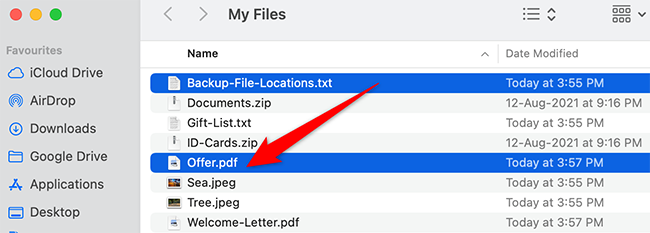 Hold down Command and click a file in Finder.