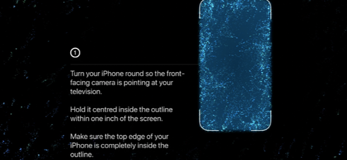 Take your iPhone close to the TV. Make sure the front camera is facing the TV