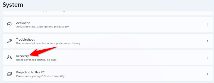 Выберите System > Recovery.