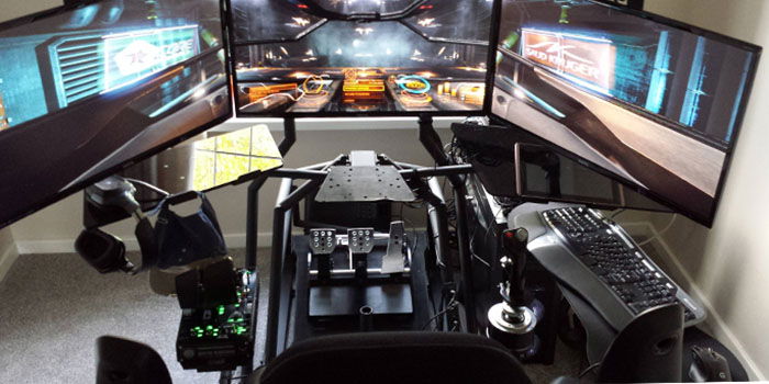 вид рабочего места с HOTAS и кабиной симулятора