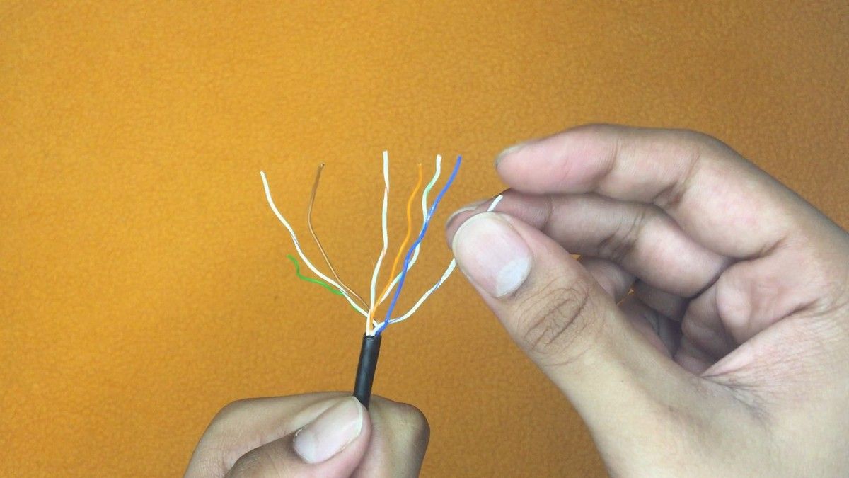 Unwinding the eight wires of an Ethernet cable