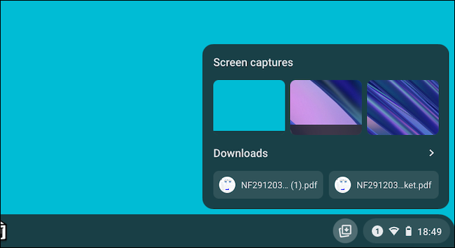 Окно Holding Space с последними скриншотами и загрузками