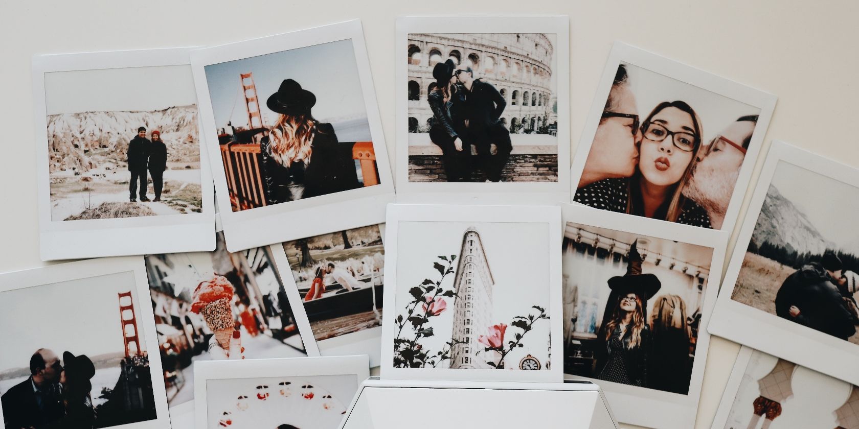 A collage of photographs on a wall