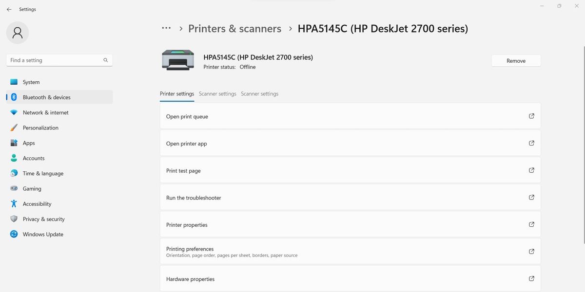 Экран настроек принтера в Windows с кнопкой средства устранения неполадок.
