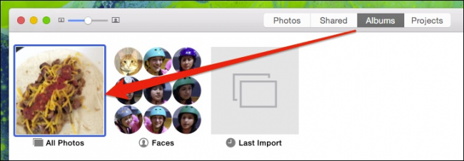 Вид альбома Все фотографии в приложении Photos с сеткой миниатюр