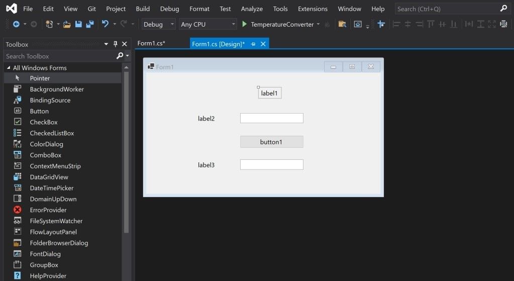 Холст Visual Studio с тремя метками, двумя текстовыми полями и кнопкой
