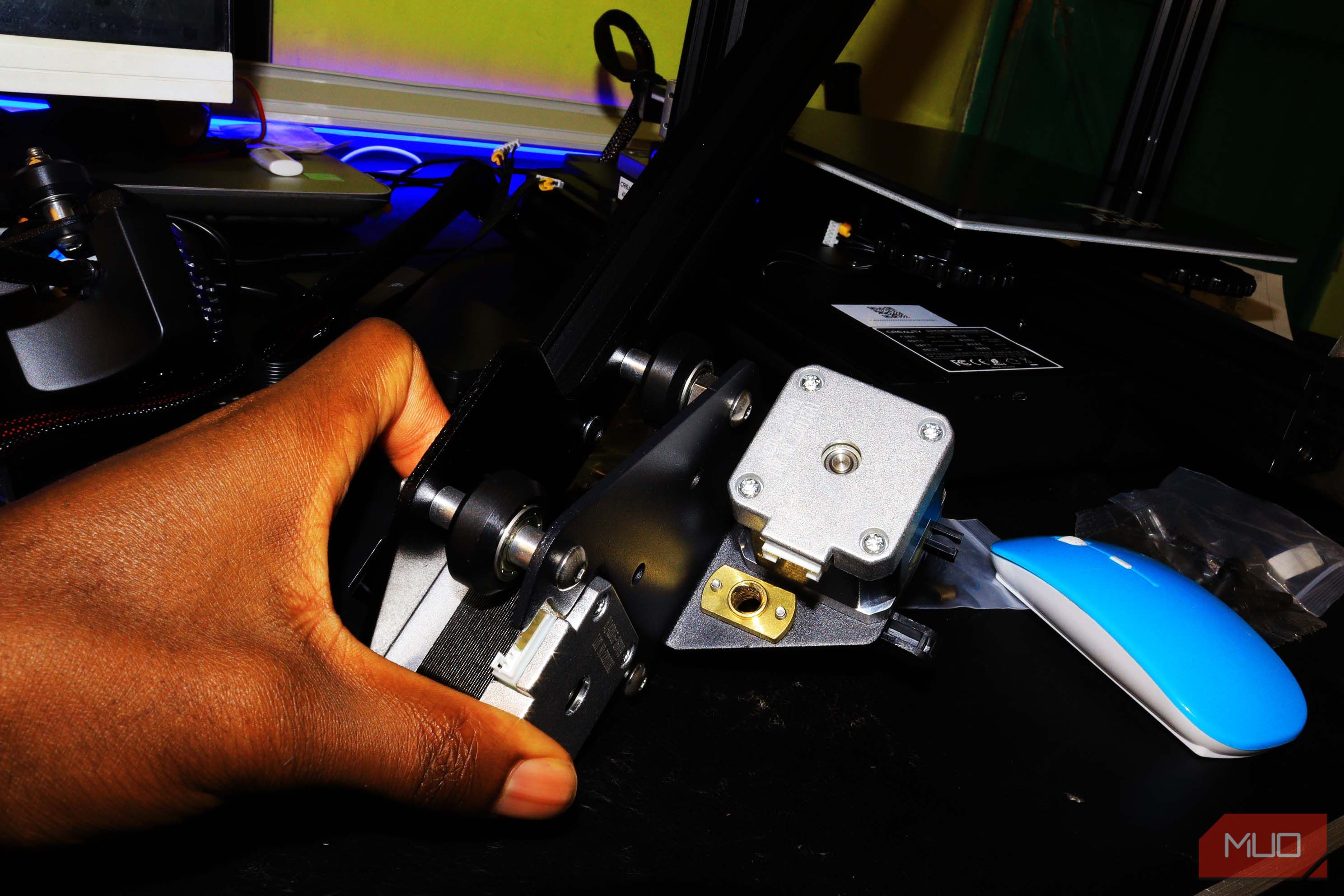 A hand holding pneumatic joints for ender 3v2