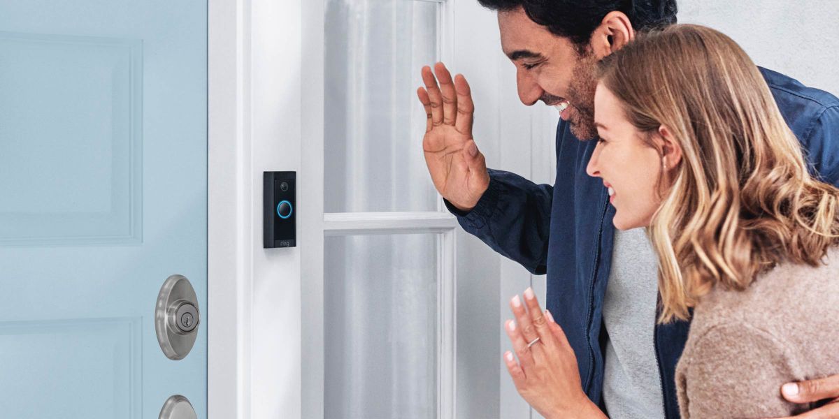 Ring Doorbell Two People Waving At It