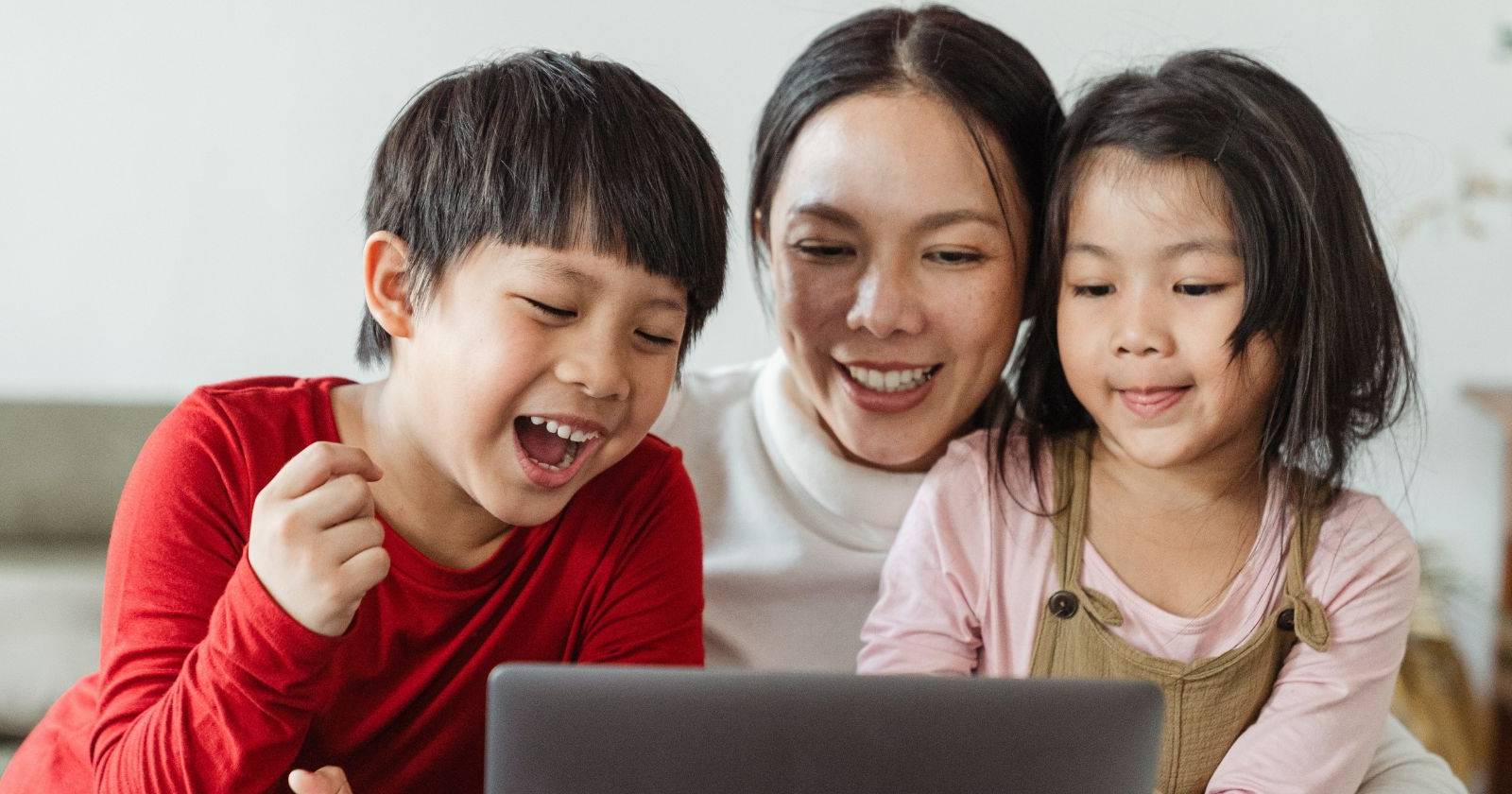 Family Watching Video on Laptop  