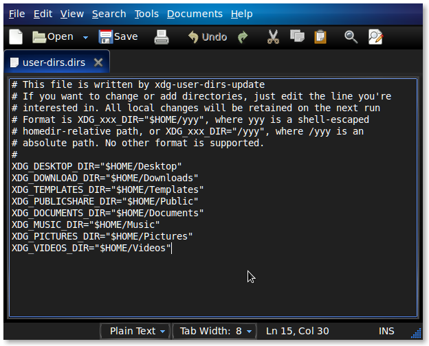 Окно gedit с файлом user-dirs.dirs до правки