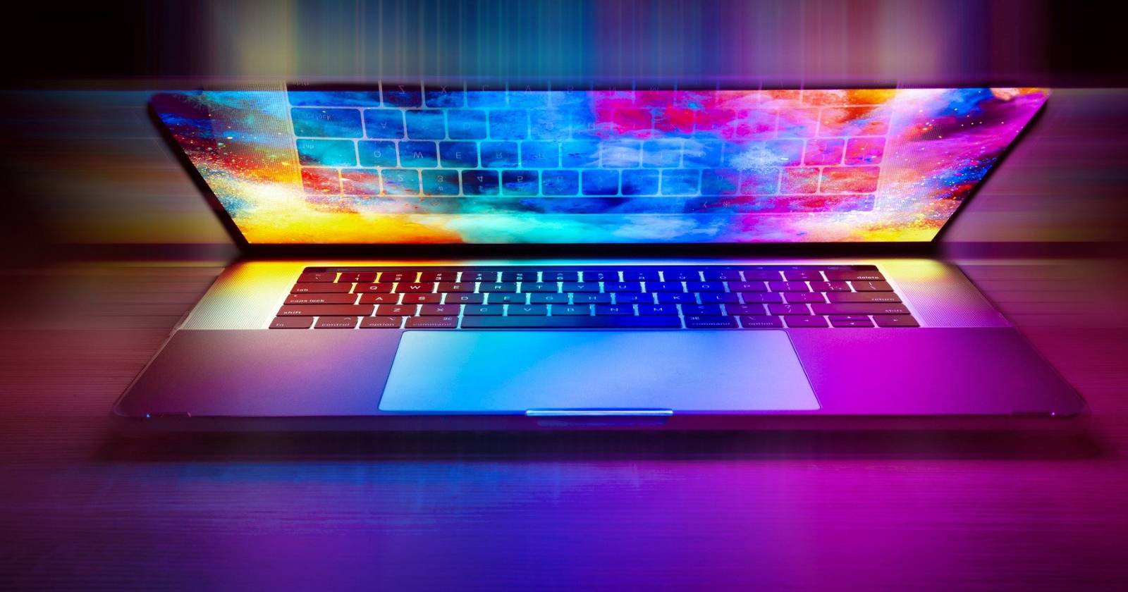 MacBook с ярким цветным изображением на экране