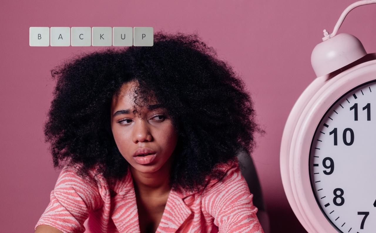 Woman staring at an alarm clock