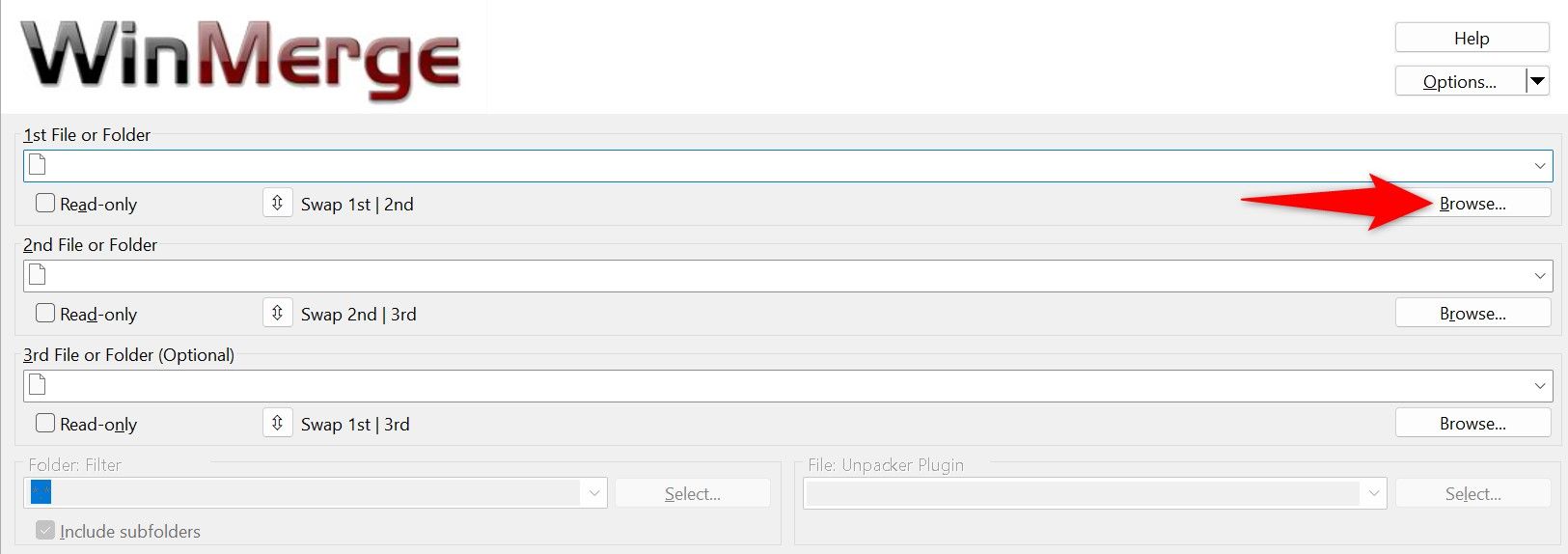 Кнопка Обзор для первого файла или папки в WinMerge выделена.