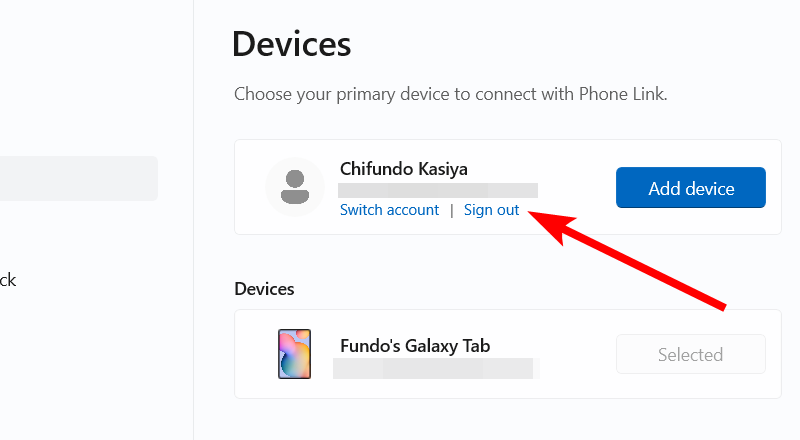 Кнопка выхода из учётной записи Microsoft в приложении Phone Link на Windows.