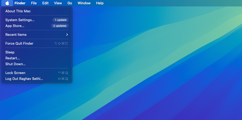 Панель меню macOS с логотипом Apple и открытым меню