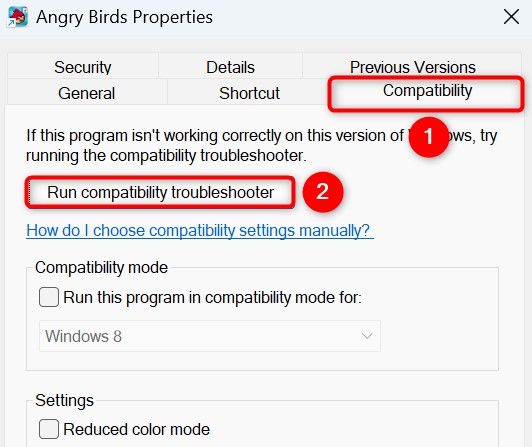 'Run Compatibility Troubleshooter' highlighted in an app's properties.