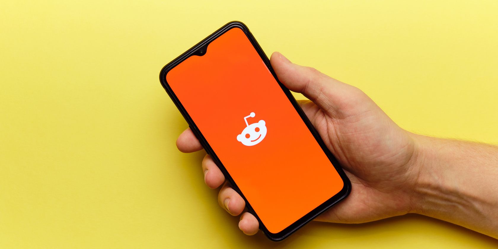 reddit logo on phone
