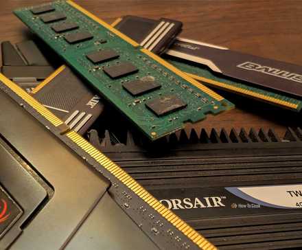 A stack of older RAM on a table.