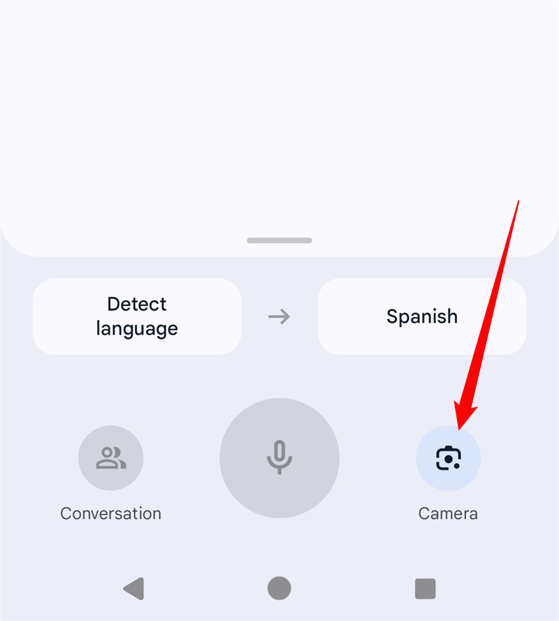 Нажмите кнопку Камера в приложении Google Translate