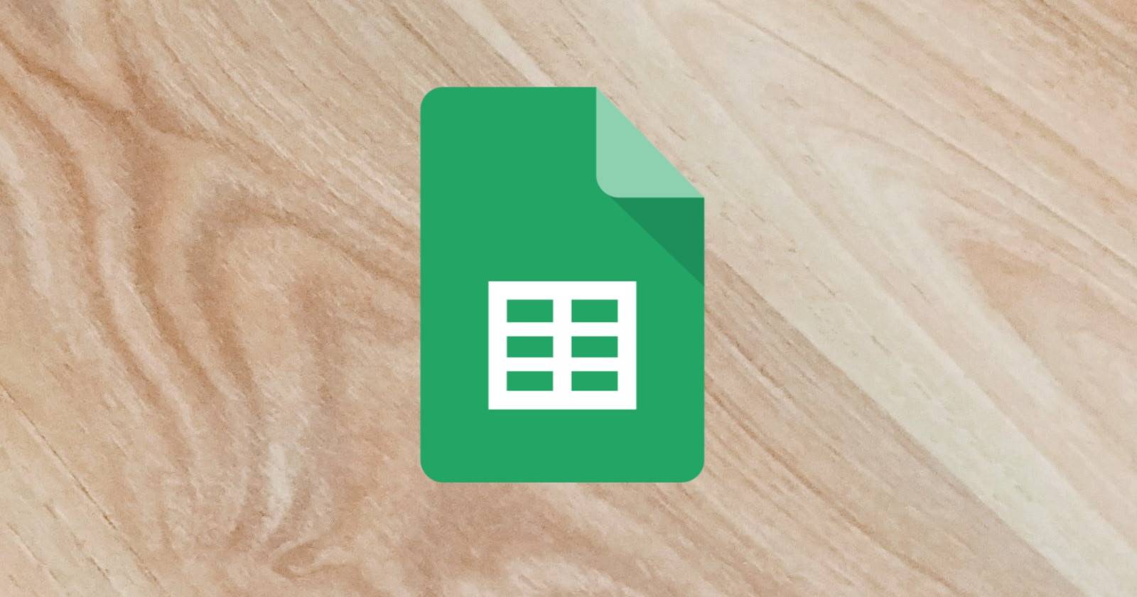 Google Sheets Logo on a Wooden Floor