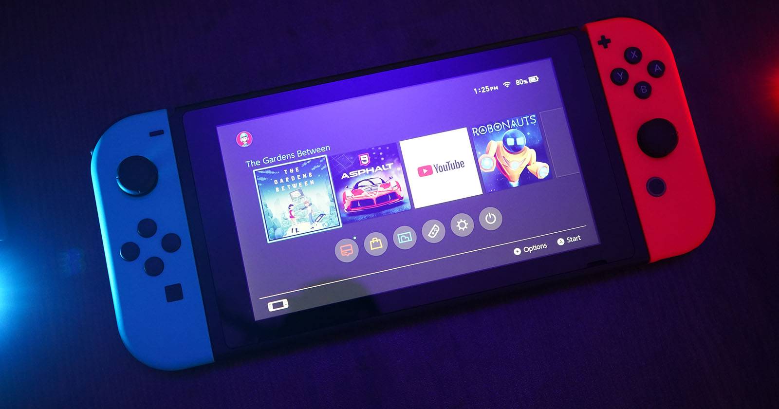 Консоль Switch с экраном игр