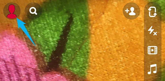 Tap the profile icon in the top-left corner.