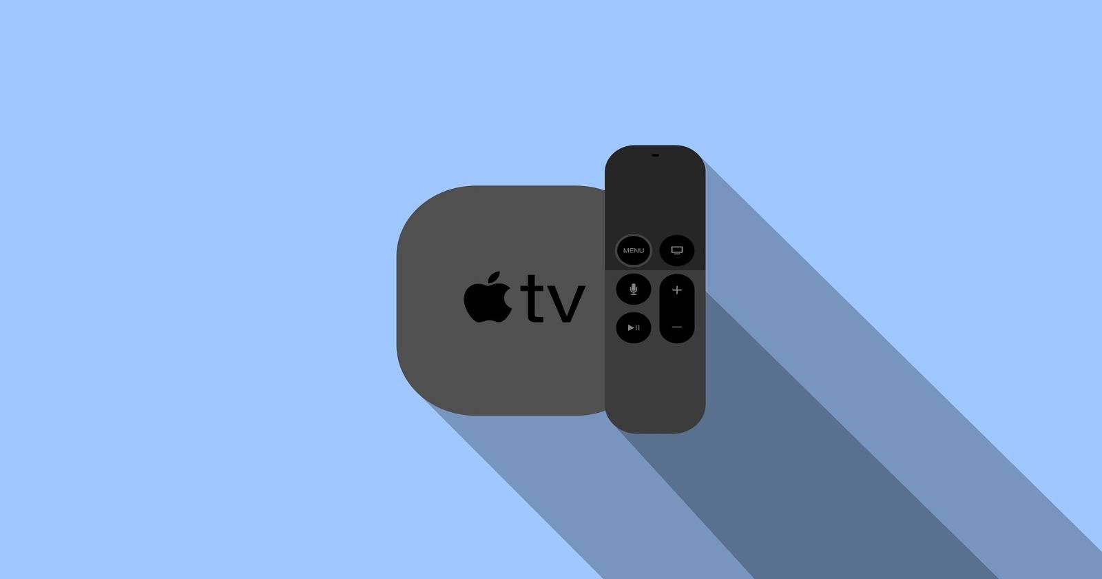 Apple TV с пультом на тёмном фоне