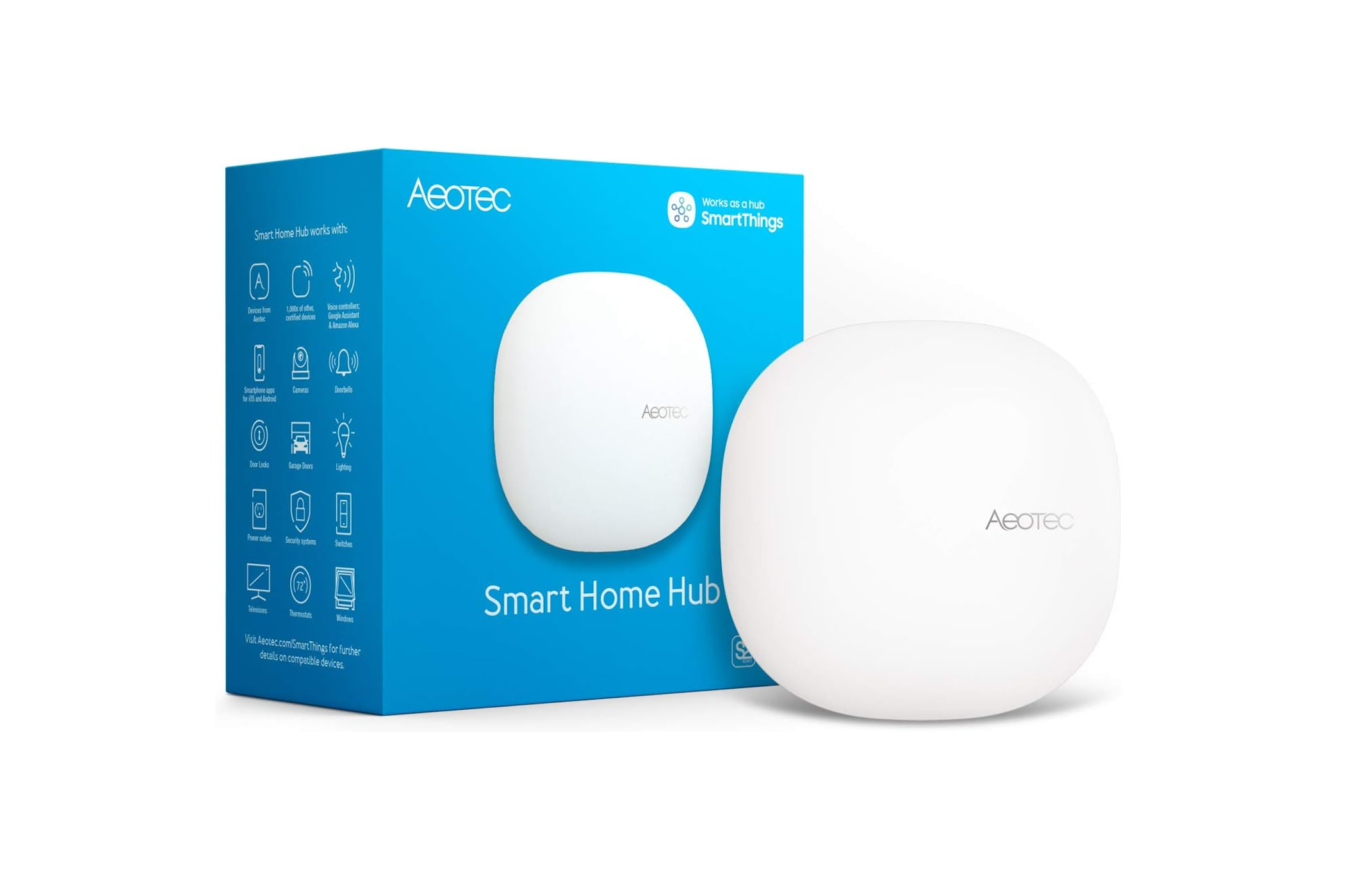 Aeoтec Smart Home Hub рядом с упаковкой на белом фоне.