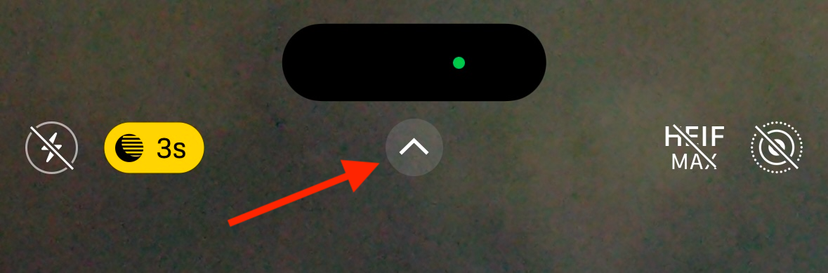 Стрелка в приложении Камера на iPhone.