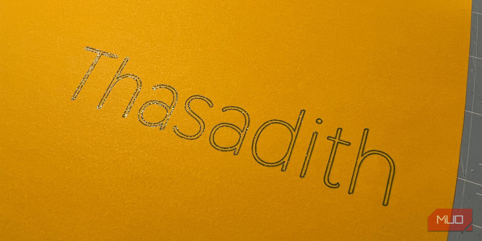 Thasadith font written in gel pen.