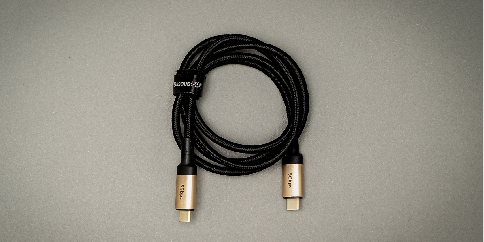 Кабель USB-C бренда Baseus на белом фоне