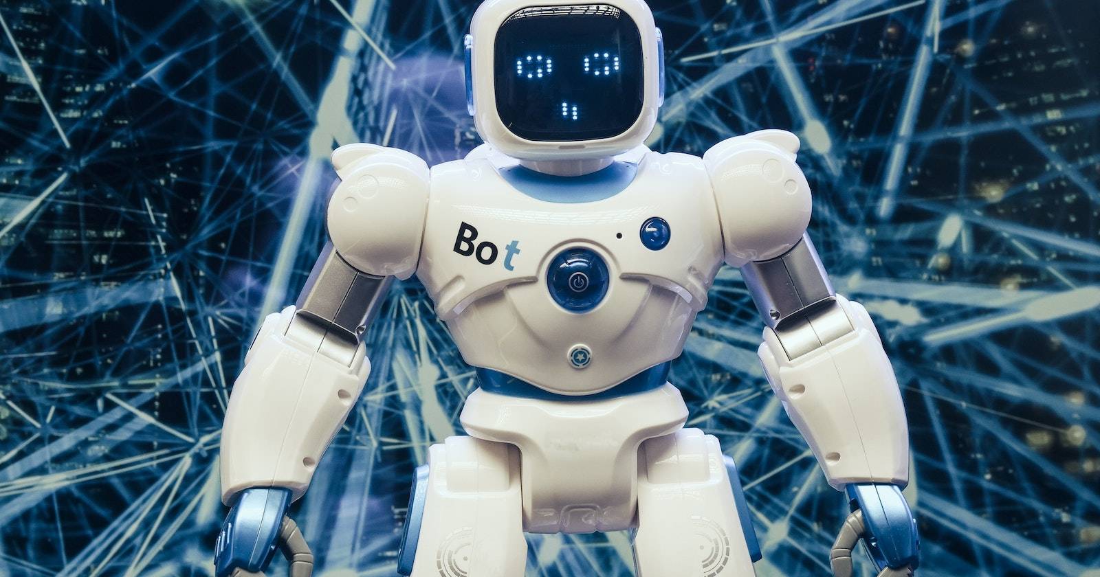 Белый и синий фигурный робот, символизирующий технологии искусственного интеллекта