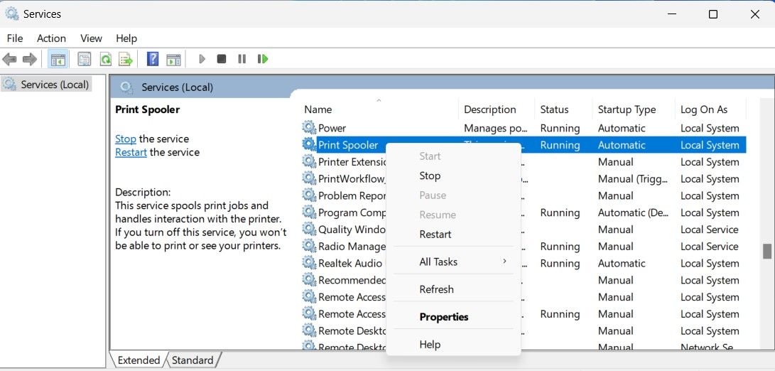 Список служб Windows с выделенной службой Print Spooler