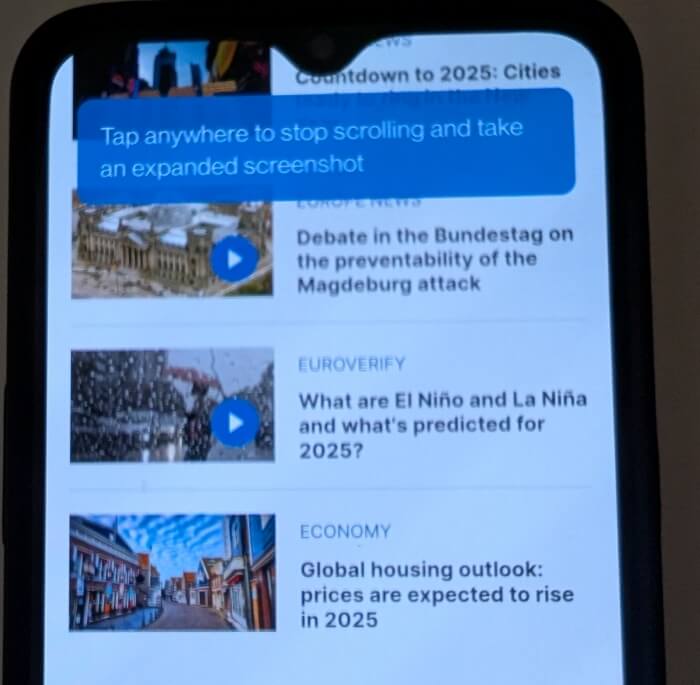 Нажмите в любом месте экрана, чтобы остановить прокрутку на OnePlus