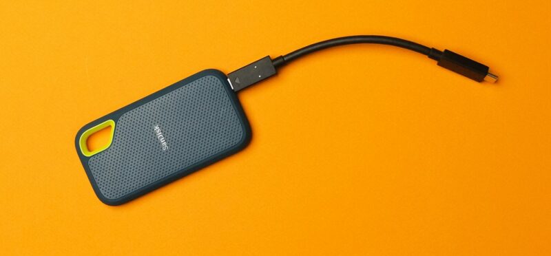 Sandisk external hard drive with USB-C cable.