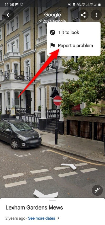 Меню из трех точек в мобильном приложении с опцией 'Сообщить о проблеме'