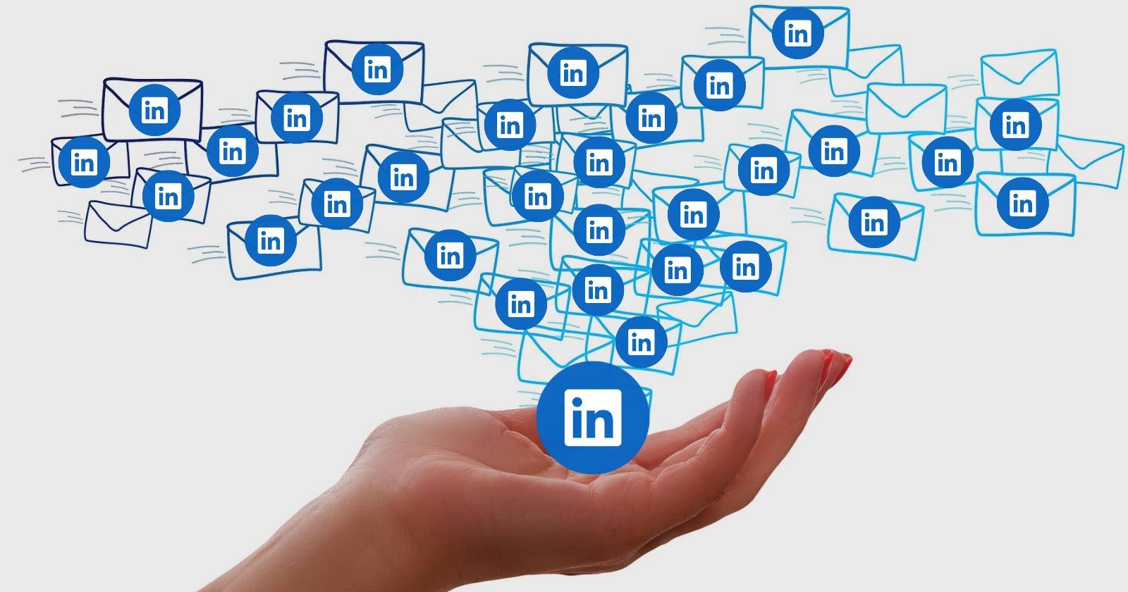 Логотипы LinkedIn на фоне поднятой руки
