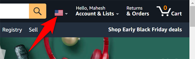 Нажмите значок флага на сайте Amazon