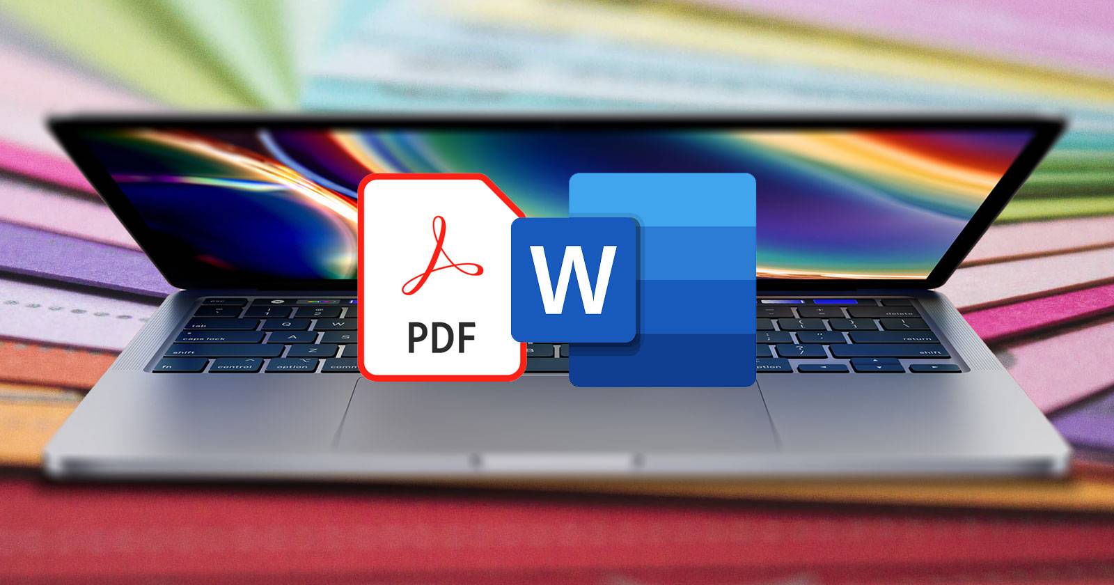 MacBook с открытыми файлами PDF и Word