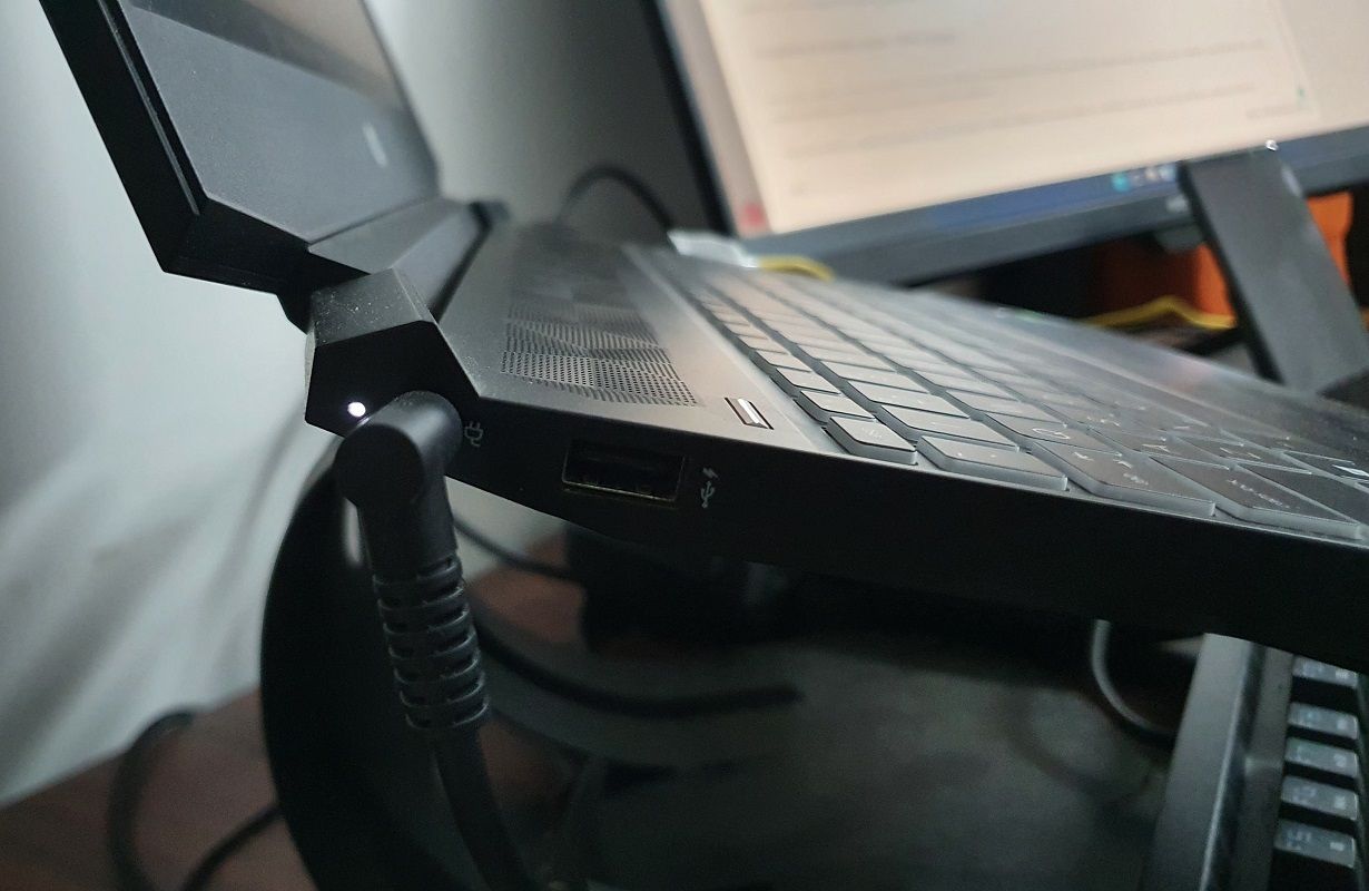 laptop being charged in a slanted position.