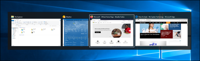 Четыре миниатюры открытых окон в переключателе задач Windows 10
