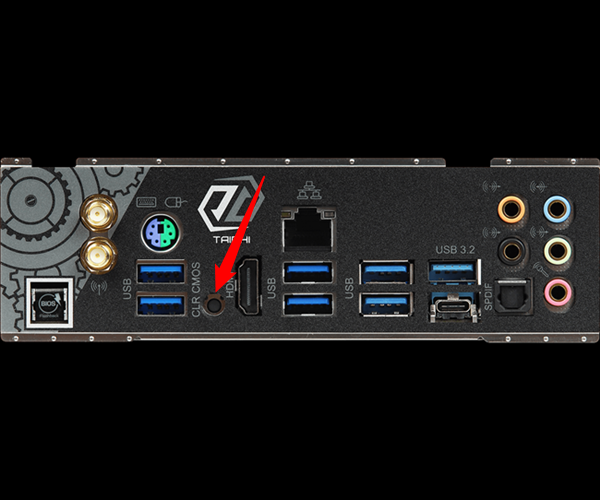 The Clear CMOS button on the back of an ASRock Motherboard.