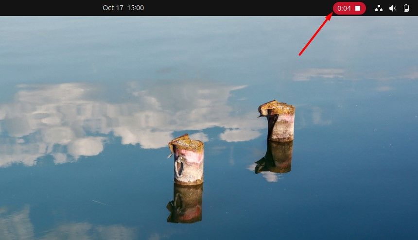 Иконка остановки в средстве записи экрана Ubuntu.