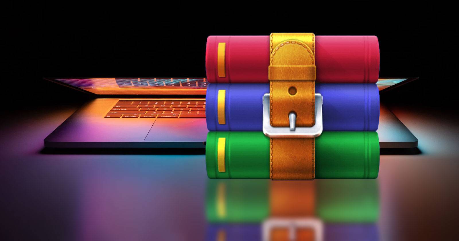 Значок RAR на фоне MacBook