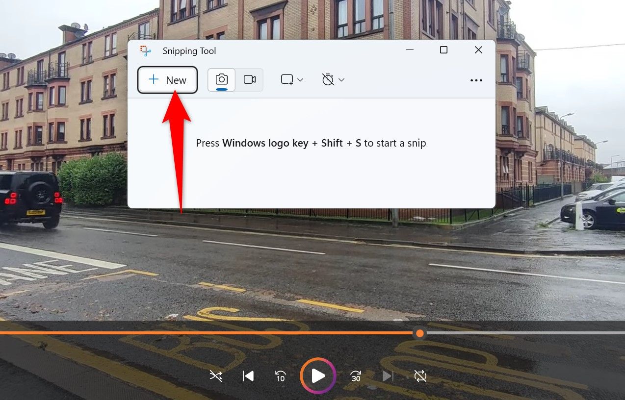 Кнопка New выделена в Snipping Tool.