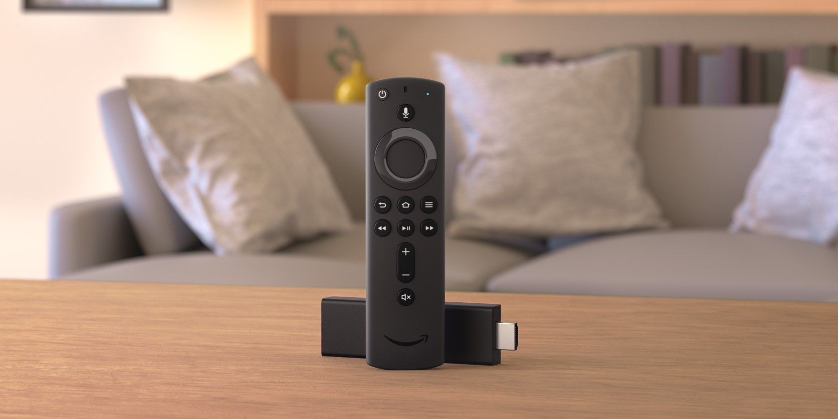 Fire TV Stick с пультом на столе