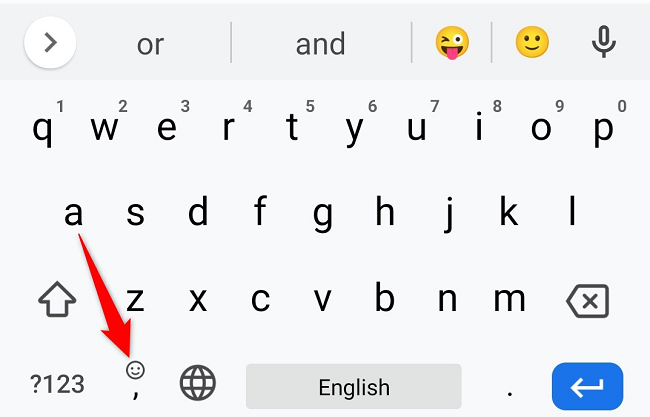 Нажмите значок эмодзи на клавиатуре