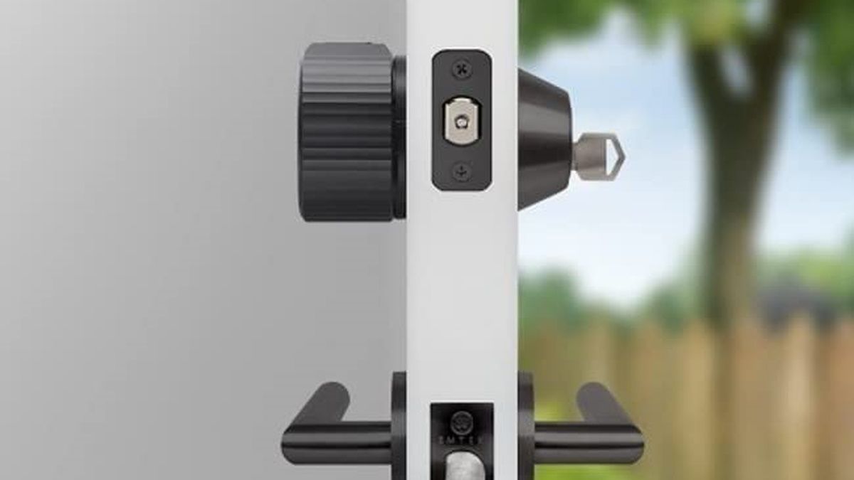 A side view of a door with an August Smart Lock installed. 