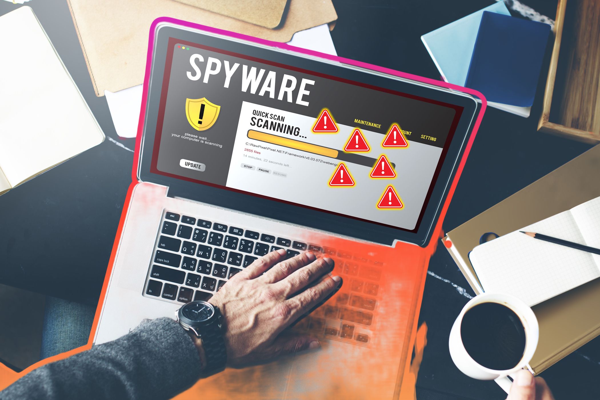 Человек проверяет ноутбук антивирусом, предупреждающие значки