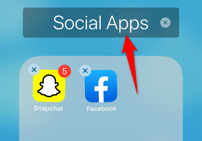 Переименуйте папку iPhone, нажав и удерживая имя папки.